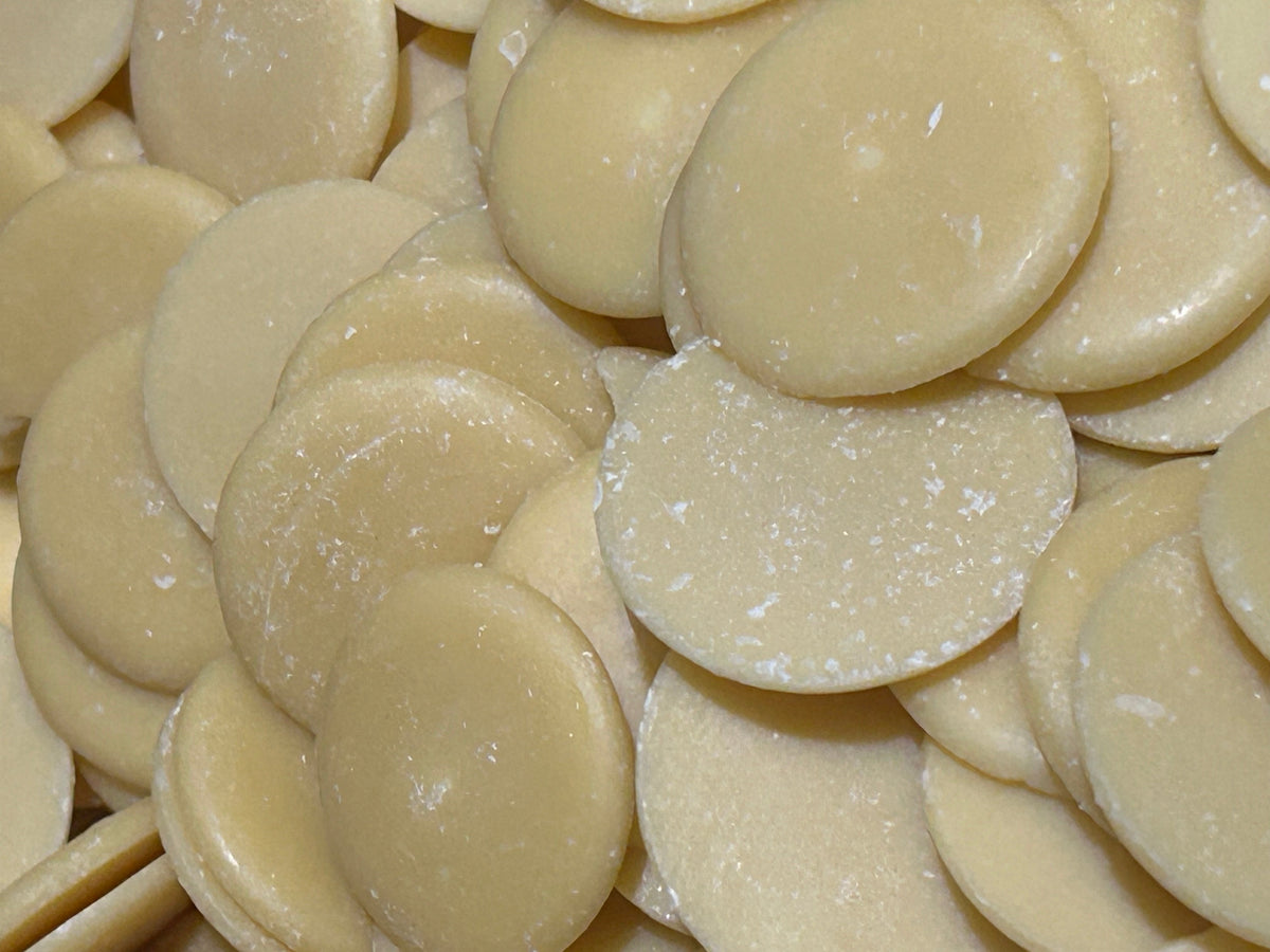 Close-up of white chocolate couverture callets