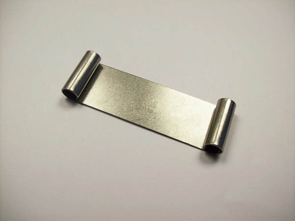 KLEM40 clamp seen from the side, showing the two rolled ends